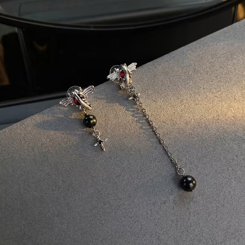Asymmetric Wing Cross Chain Huggies — Pair