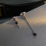 Asymmetric Wing Cross Chain Huggies — Pair